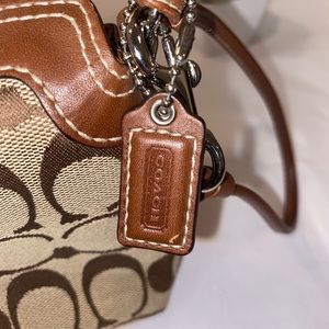 COACH Signature Canvas Fold-over Wristlet